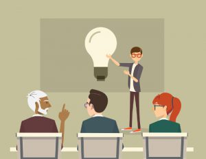 Guy presenting an idea on a board in a meeting