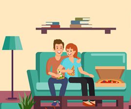 couple eating pizza in front of the TV