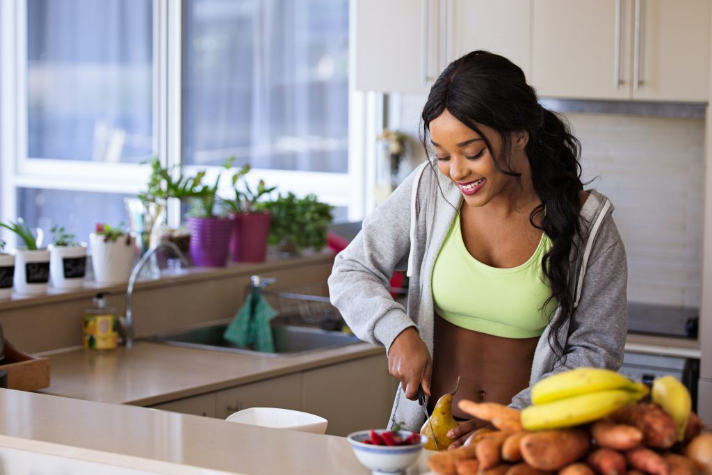 Woman chopping up veggies