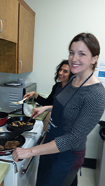 Maggie and Lisa cooking meatless