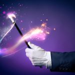 hand holding wand