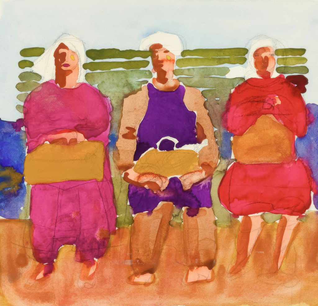 A group of women seated at a meeting to show community.