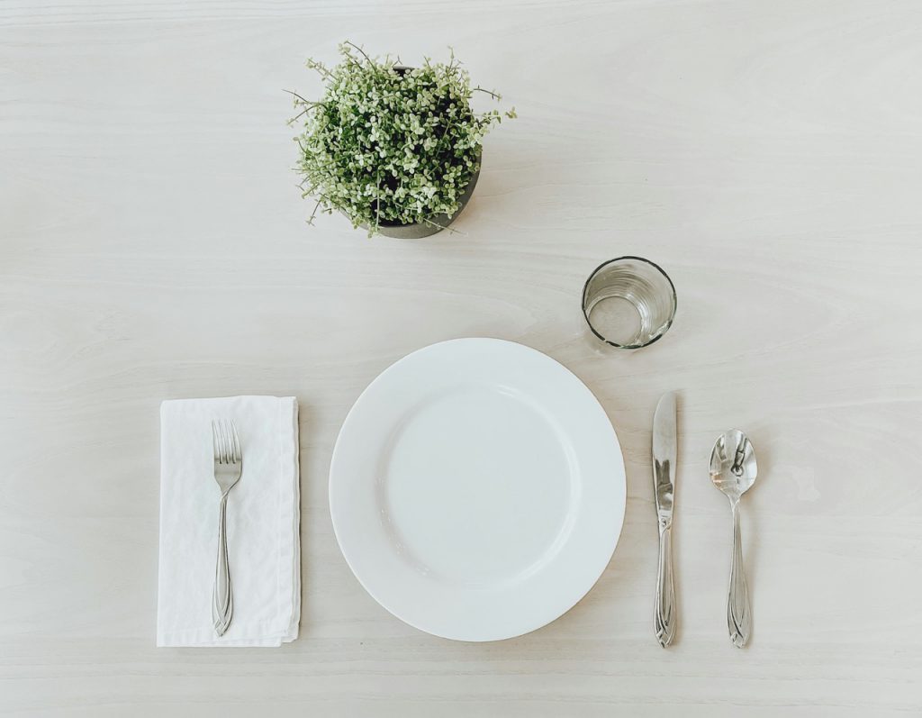 An empty plate represents setting an intention before mealtime.
